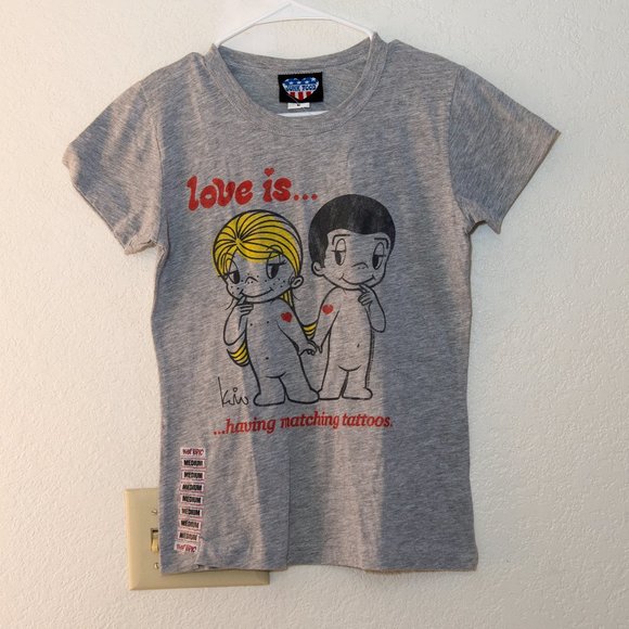 Junk Food Clothing Tops - Brand New w Tags, Love is Having Matching Tattoos tee. Kim Casali artist.